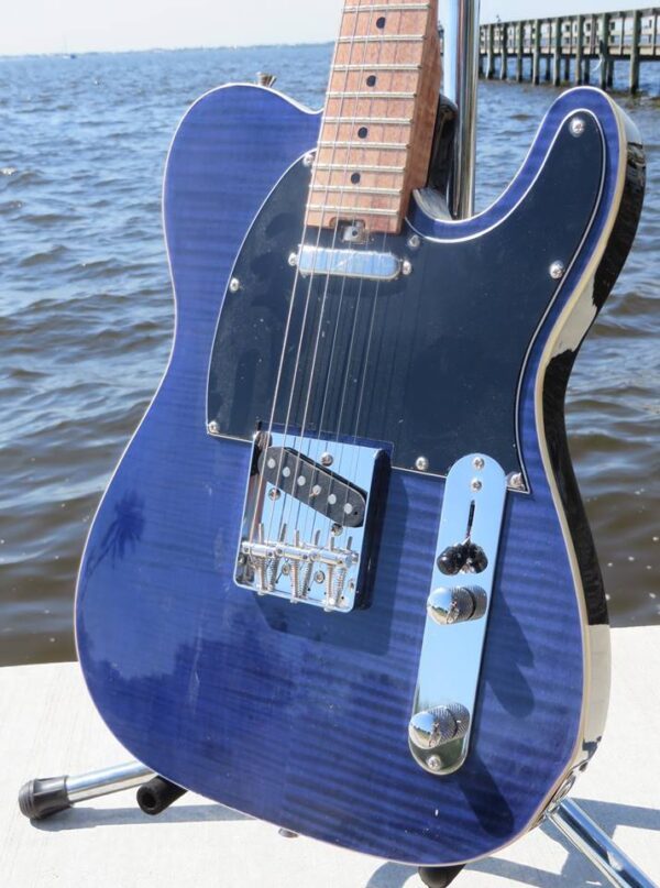 by the water close-up of blue flame maple topped tele
